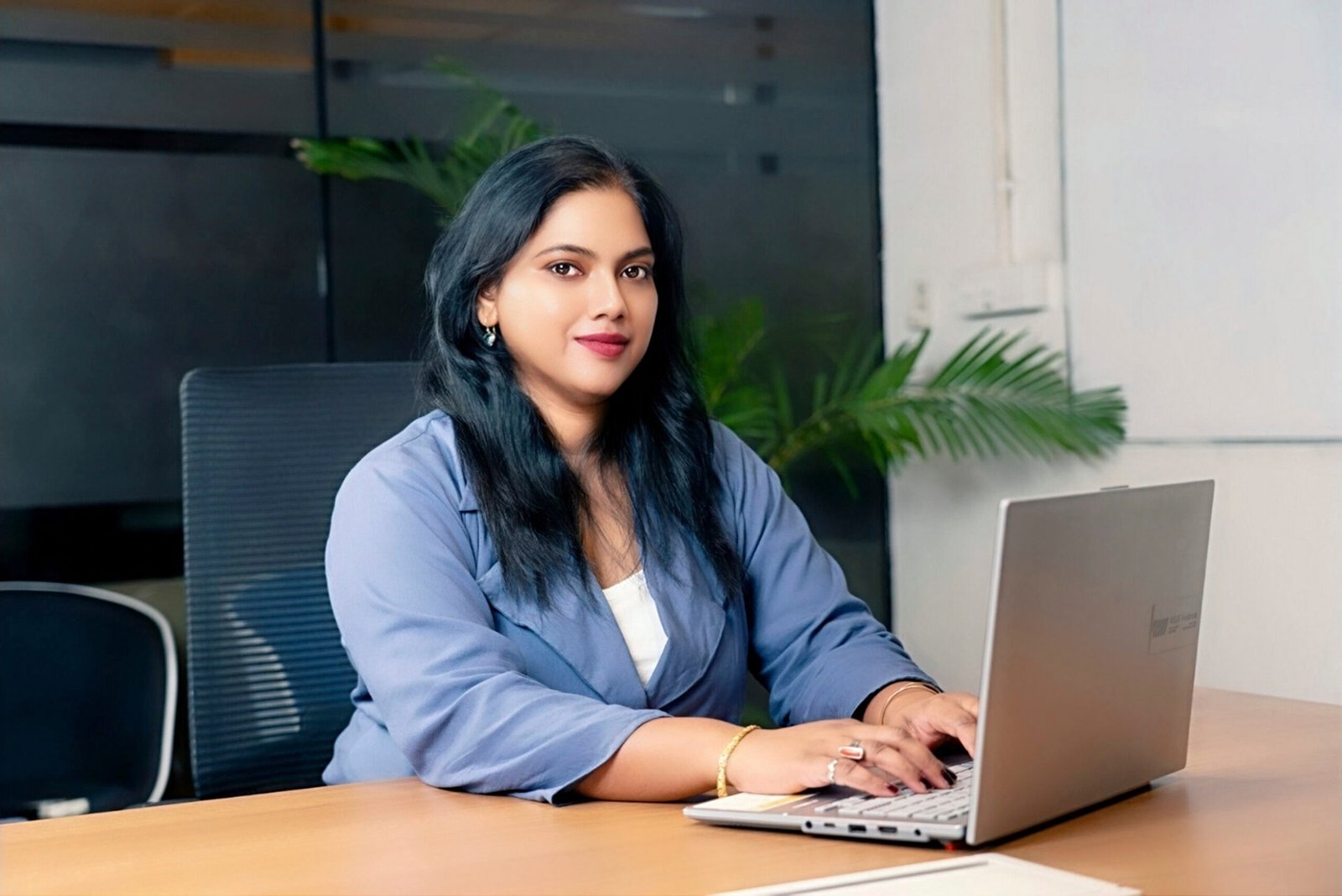 Anita Swain coaching at desk